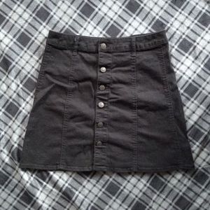 Black stretch denim button miniskirt
